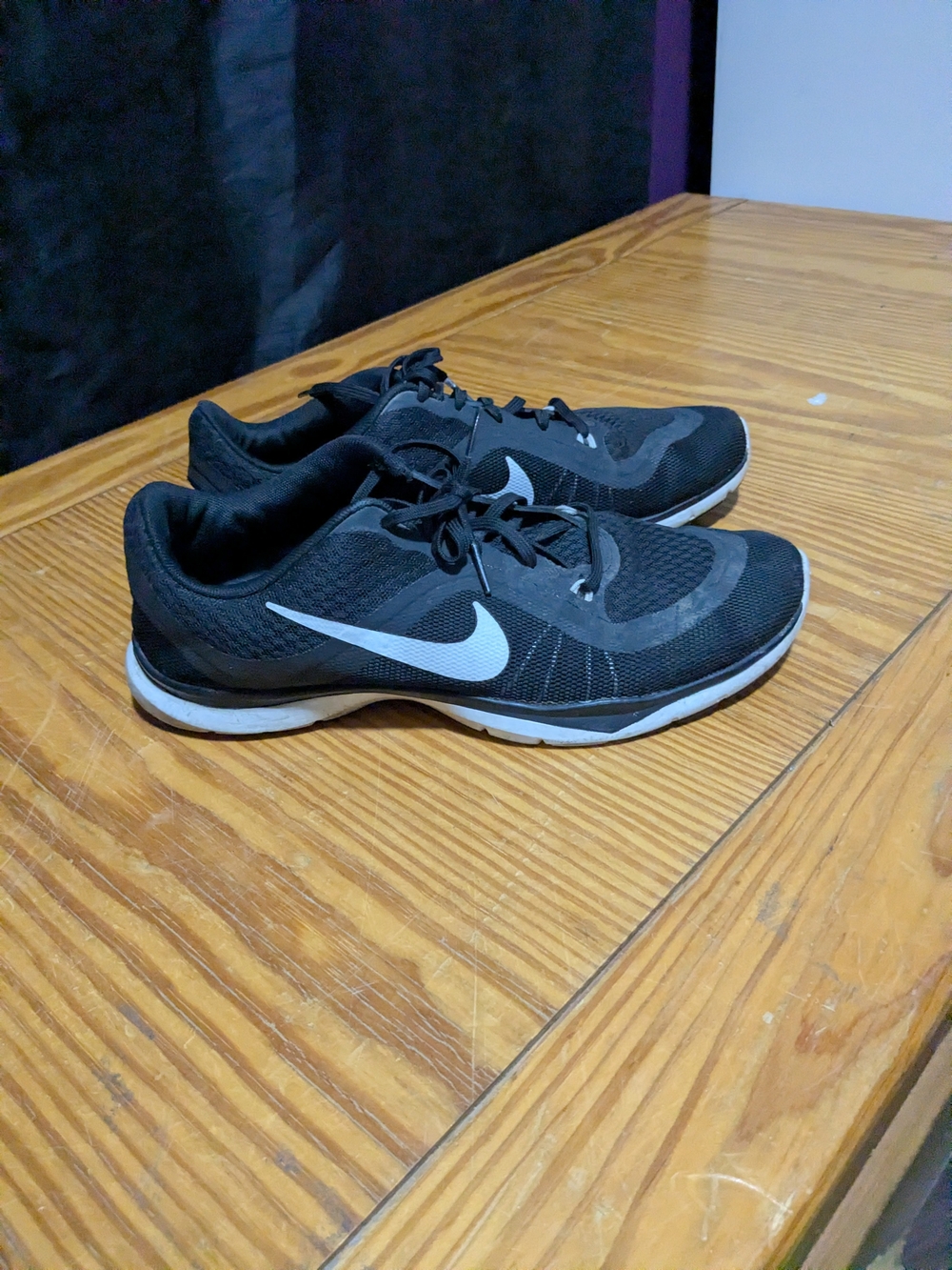 Nike Women’s Black Athletic Shoes with White Swoosh